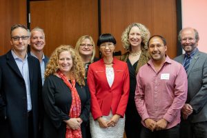 Representatives from Illumina join UW–Madison leadership during a visit to the School of Medicine and Public Health