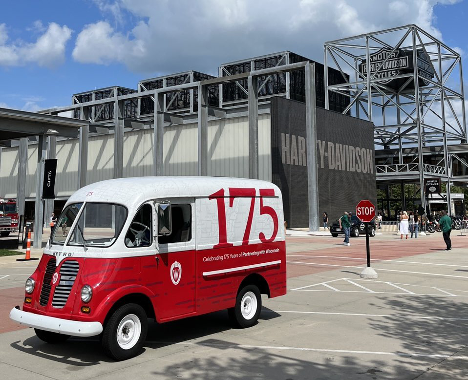 Red and white 175 truck in front of Harley Davidson Museum