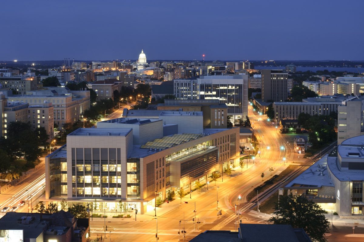 Skyline of UW-Madison campus featuring the wisconsin Insittures for Discovery and Wisconsin State Capitol in the background