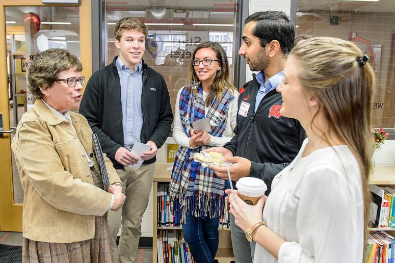 Students gathered around Chancellor Blan at opening of Career Exploration Center