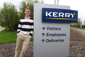 Chase Bruggeman poses outside of the Kerry building