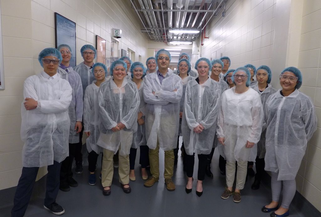 UW-Madison students pose in a hallway at Kerry Group after a tour of the facilities