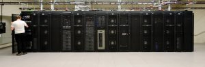 Interior room: large black computer data processor fills image