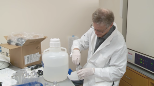 Filling hand sanitizer at Pharmacy Practice Division