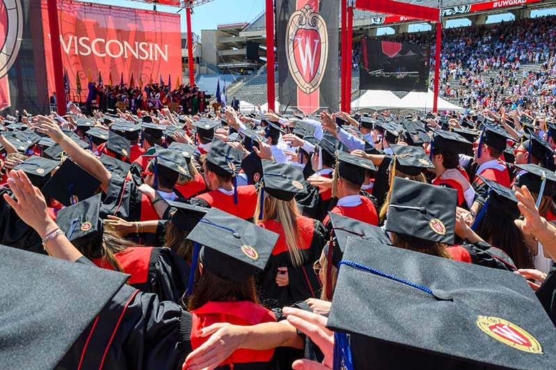 Photo of graduates at Spring 2022 Commencement at Camp Randall Stadium