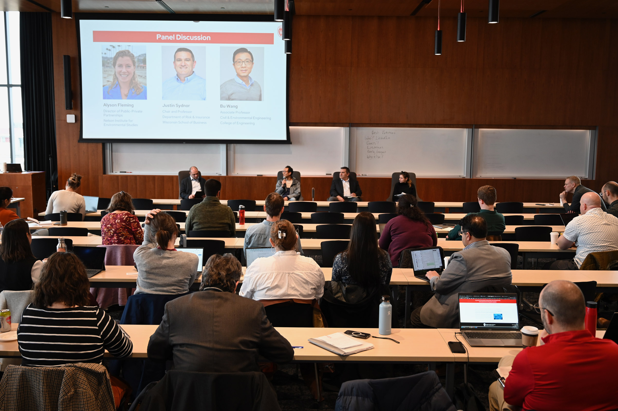 Expert panelists Alyson Fleming, Director of Public-Private Partnerships at the Nelson Institute for Environmental Studies, Justin Sydnor, Chair and Professor of the Department of Risk & Insurance at the Wisconsin School of Business, and Bu Wang, Associate Professor of Civil & Environmental Engineering at the College of Engineering.